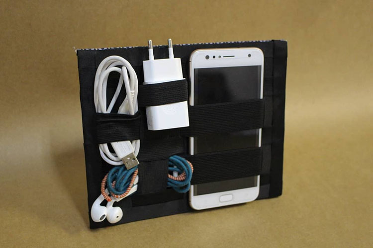 Porta-treco tem a finalidade de guardar, de forma organizada, objetos dentro de bolsas e mochilas Porta-treco tem a finalidade de guardar, de forma organizada, objetos dentro de bolsas e mochilas